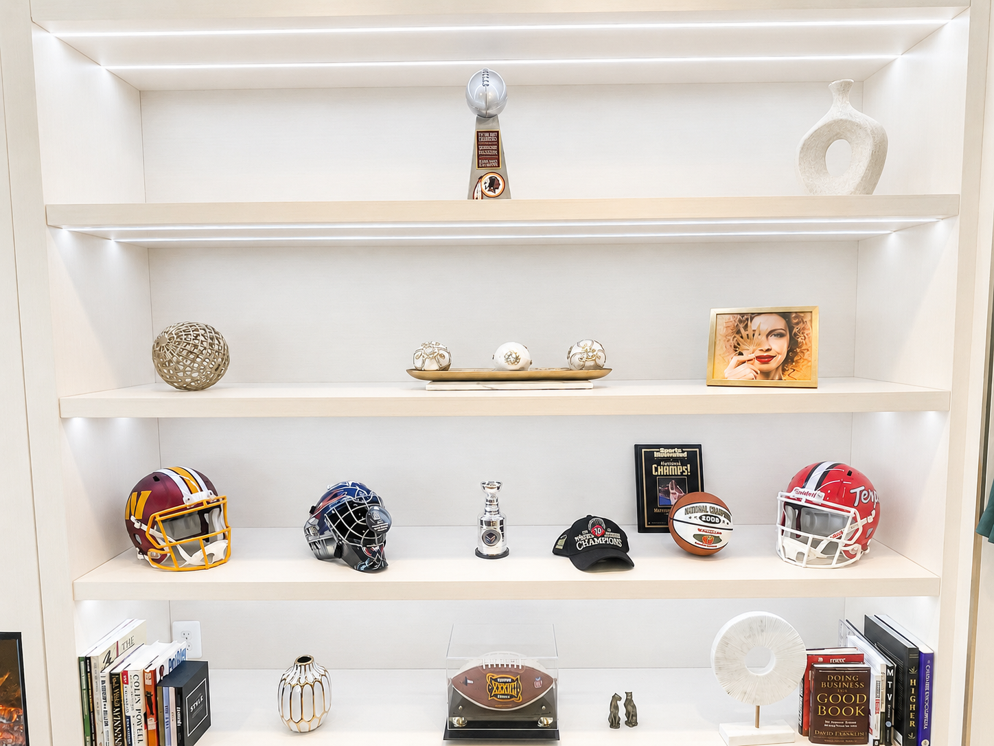 SOL OF POTOMAC DISPENSARY PENTHOUSE 5 SOL of Potomac Dispensary Penthouse sports memorabilia shelving with Washington helmets and trophies